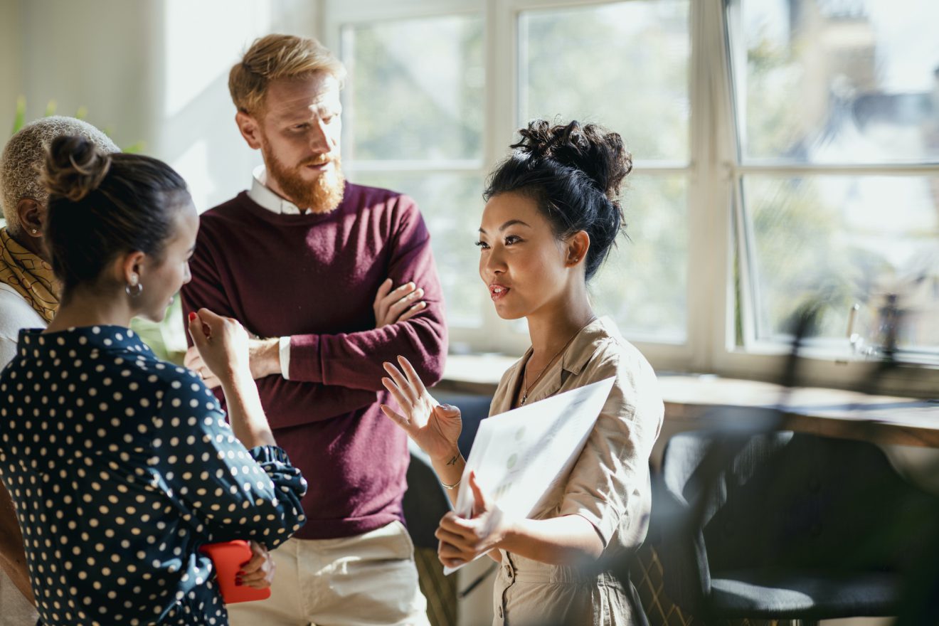 Team members discussing a project